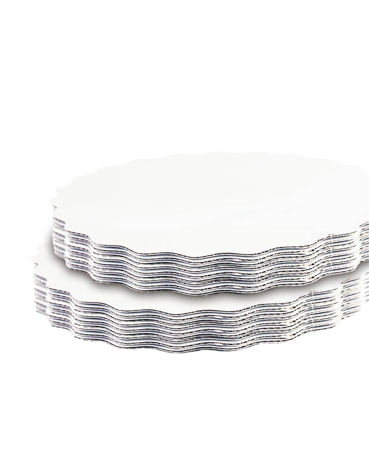 Two-layer stack of white round wave cake boards with scalloped edges
