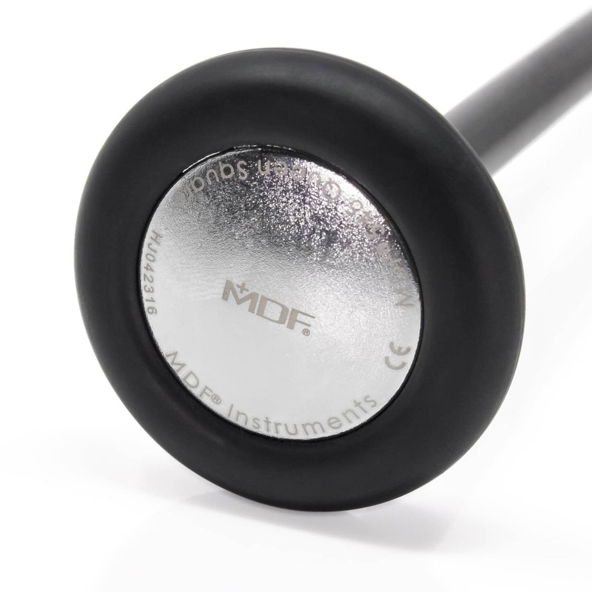 Black reflex hammer head close-up with MDF logo and CE marks