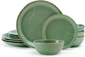 Green dinnerware set with embossed botanical pattern: plates and bowls for serving