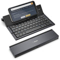Foldable Bluetooth keyboard with backlit keys and tablet stand, dark gray.