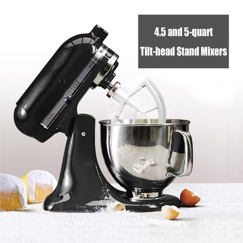 White flexible edge beater attachment on a tilt-head stand mixer with metal bowl