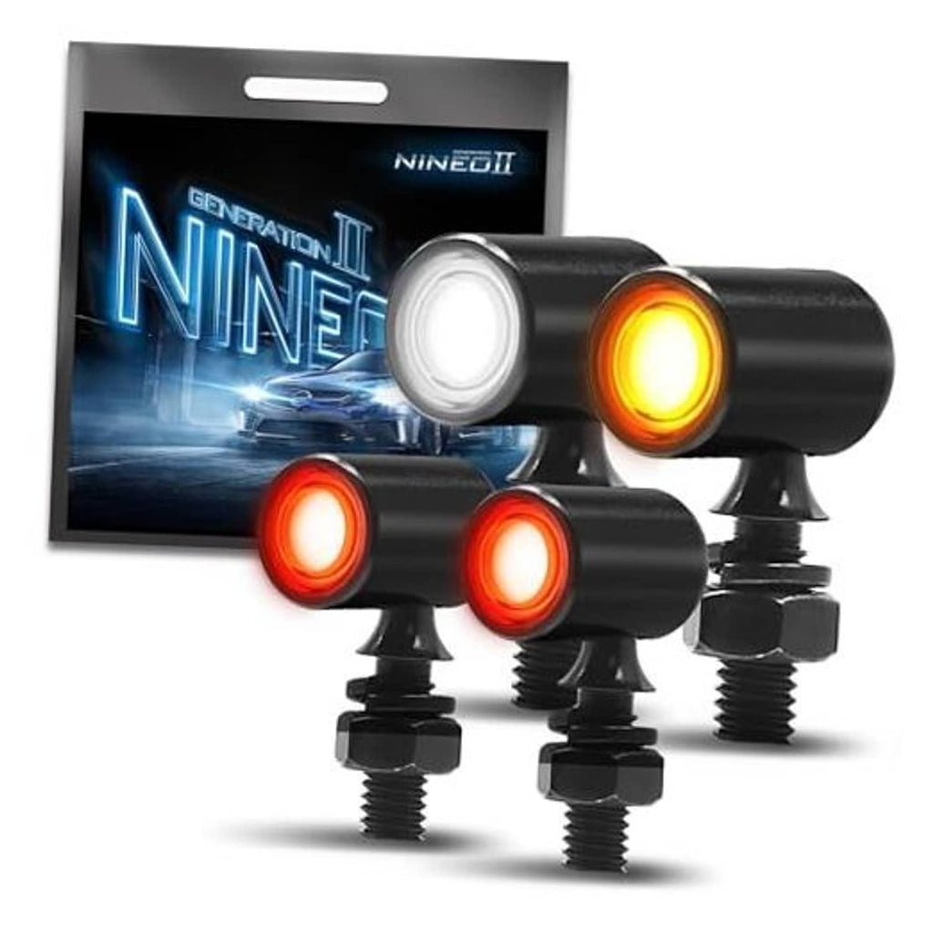 Mini LED motorcycle turn signals set with white and amber lenses, black mounting hardware