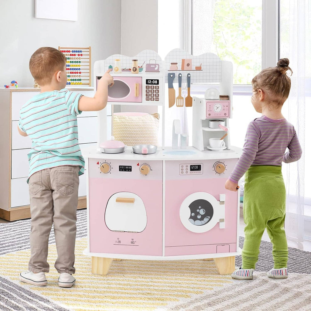 Pink and white wooden play kitchen set with coffee maker and microwave, kids playing