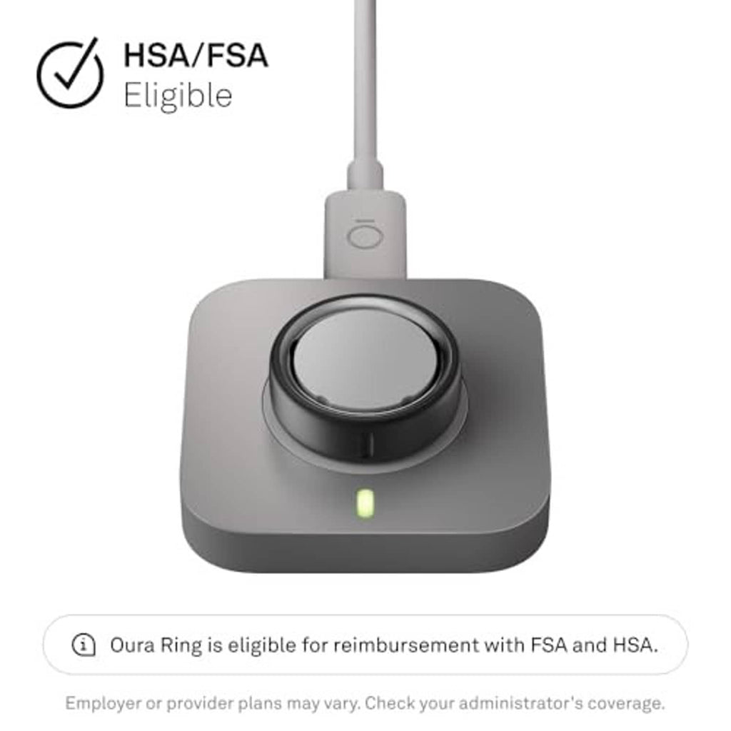 Gray charging dock with circular cradle and glowing status indicator