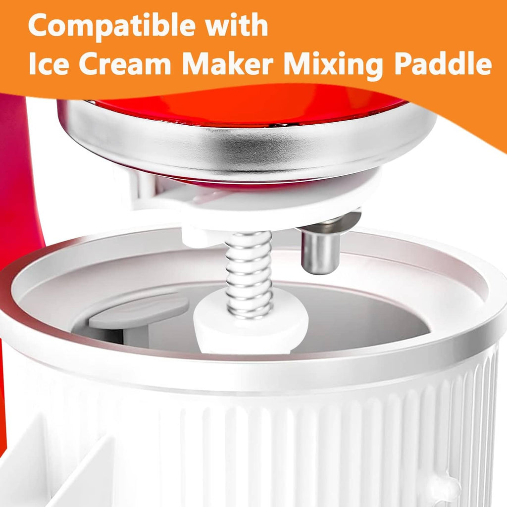 Ice cream maker mixing paddle and spring inserted into white frozen bowl