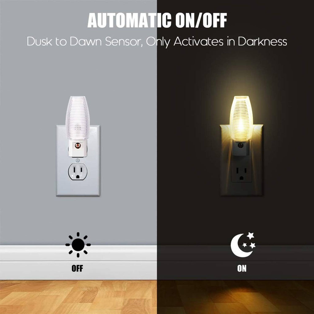 Plug-in LED night light in wall outlet with dusk-to-dawn sensor and warm glow