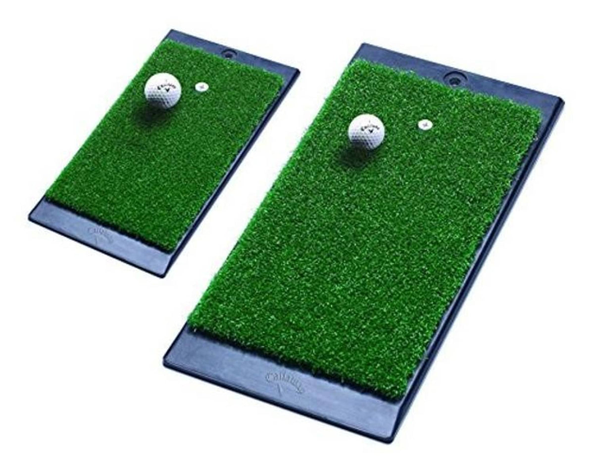 Pair of green turf hitting mats with dark weighted bases and golf ball targets