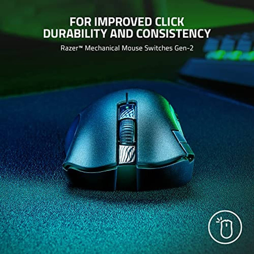 Dark gaming mouse with RGB lighting and teal-green glow effects on surface