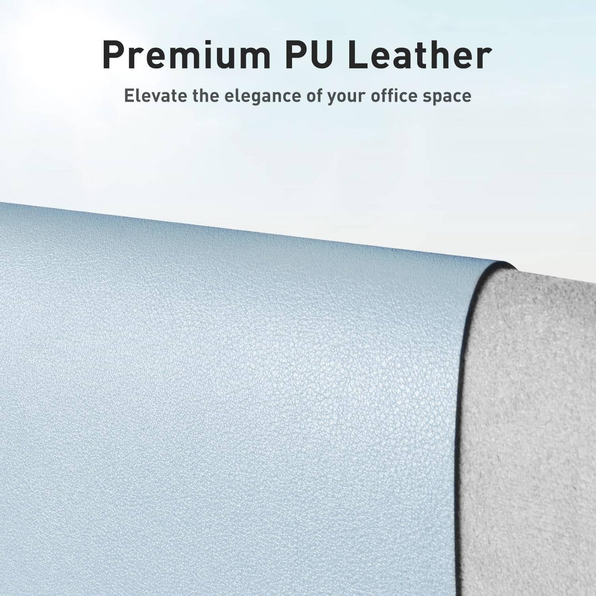 Baby blue leather desk pad protector close-up of pebbled surface edge