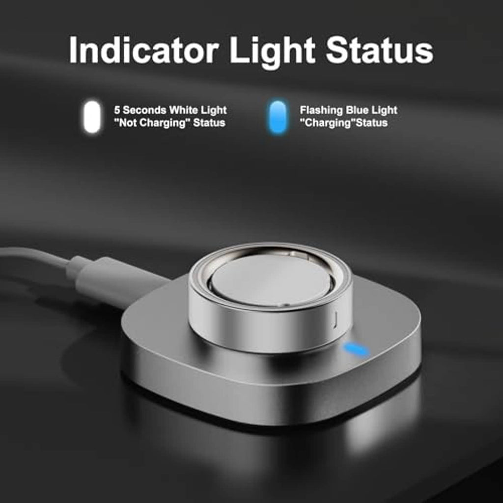 Grey charging dock with metal cradle and glowing blue status indicator light