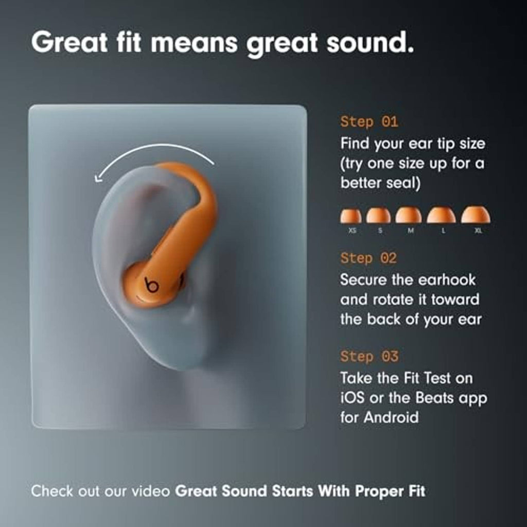 Orange earbud and ear tip showing secure-fit seal for wireless workout earbuds