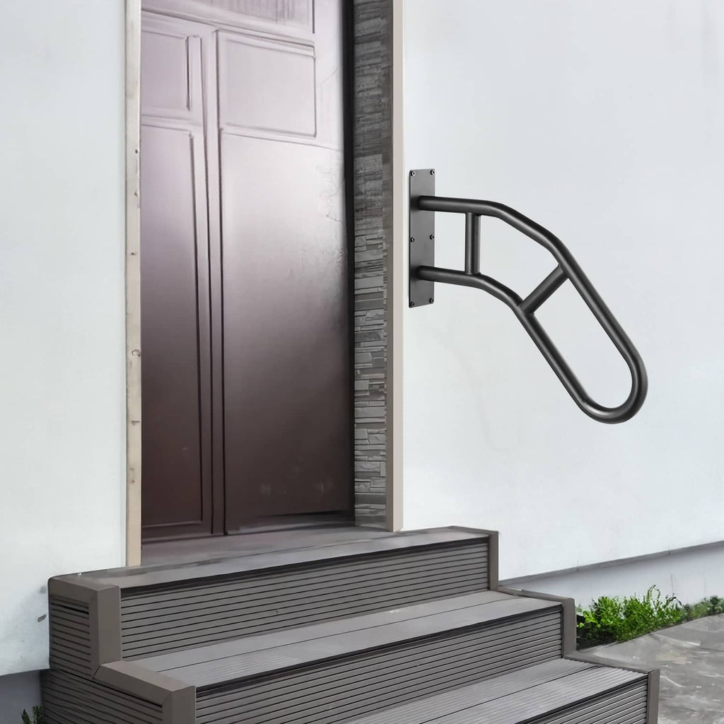 Wall-mounted handrail beside front steps with curved matte black grip