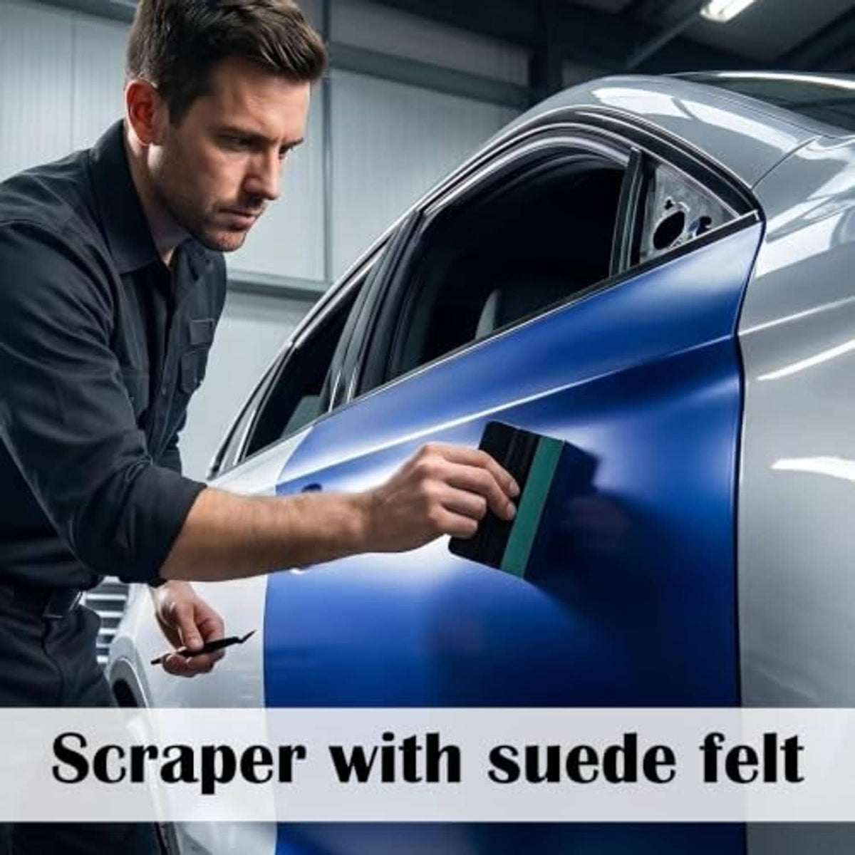 Suede-felt window tint scraper tool used on a car door window