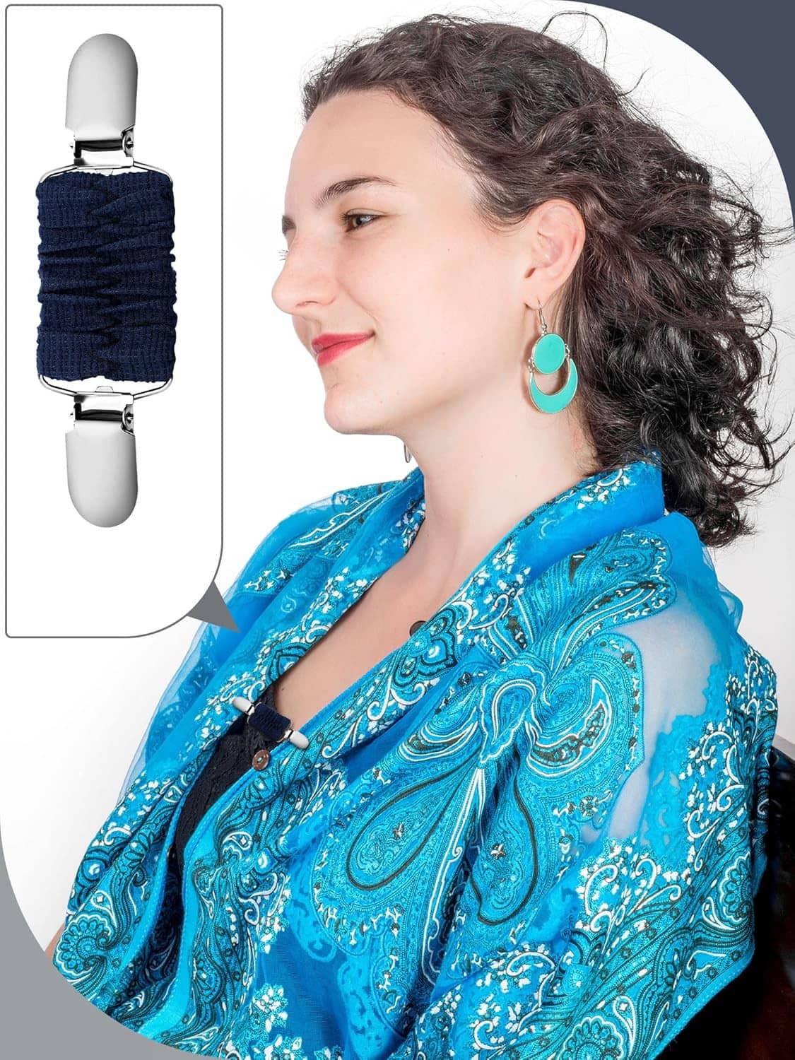 Dress cinch clip detail on a blue patterned top at the back neckline