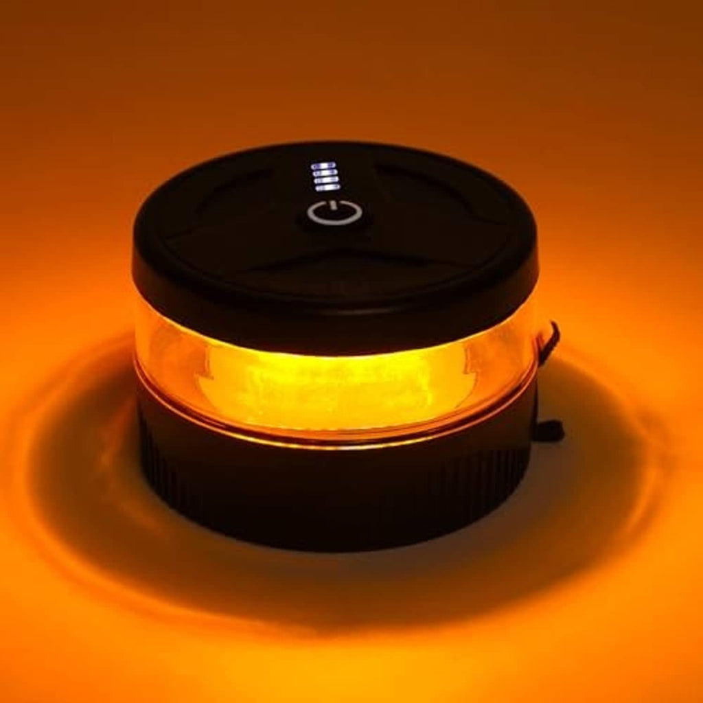 Round black LED rechargeable strobe warning light with amber glowing lens