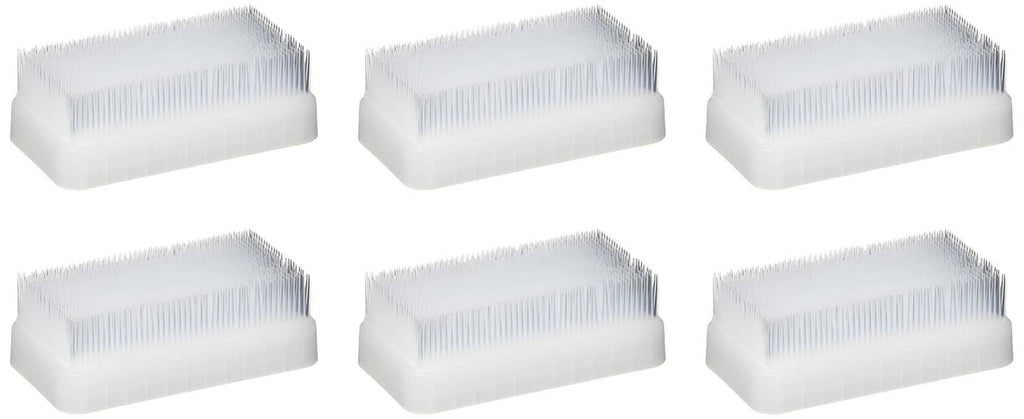 Therapy brush set of six white foam blocks with short bristles, arranged in rows