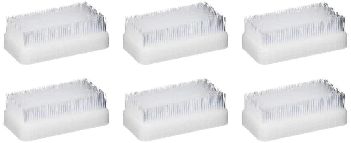 Therapy brush set of six white foam blocks with short bristles, arranged in rows