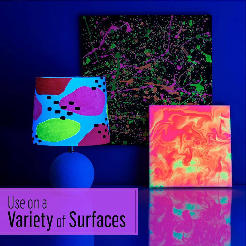 Glow paint on wall art and fabric, with green speckle glow effect across surfaces.