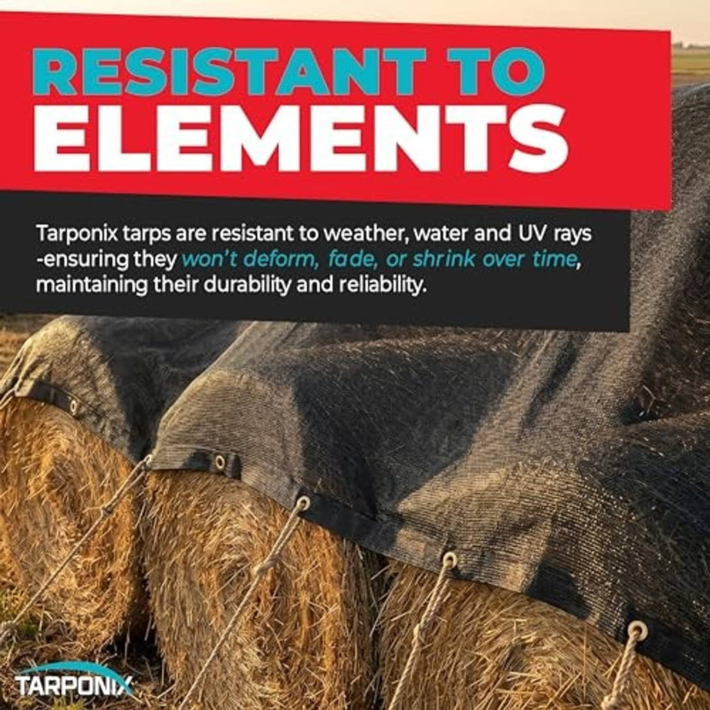 Black mesh shade tarp secured over hay bales with grommets