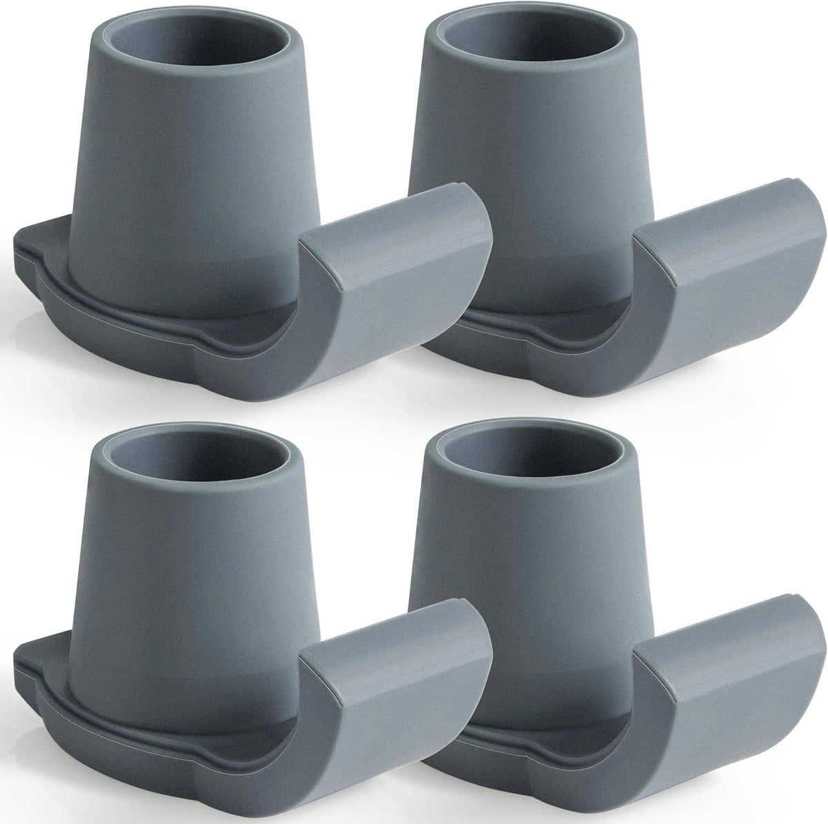 Four gray ski glide caps for walker legs, curved base with raised runner