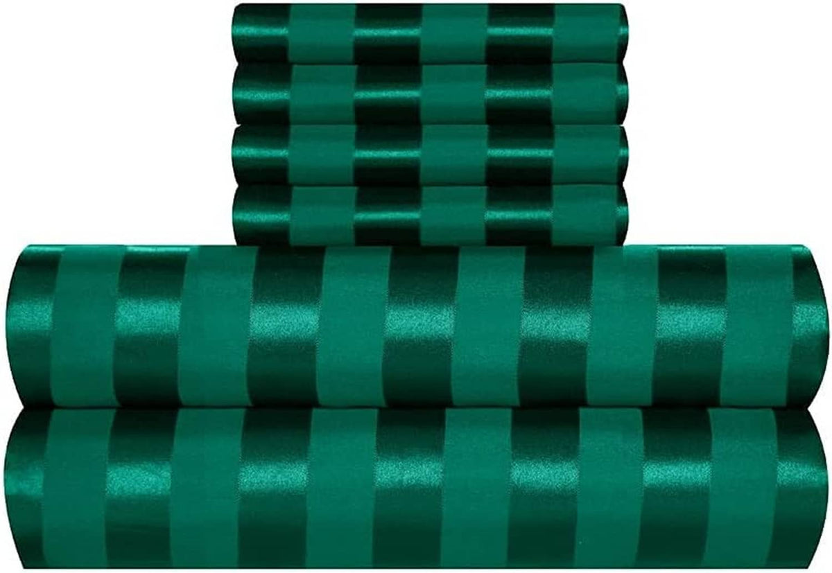 Rolled teal green satin stripe fabric pieces stacked, showing pattern alignment