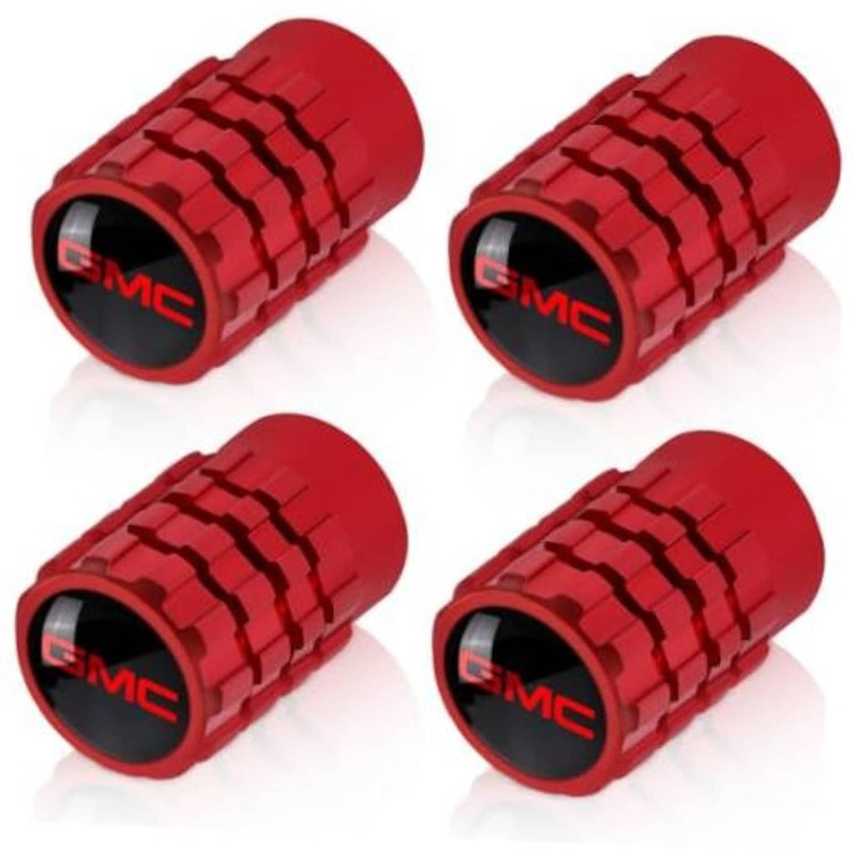 Set of four red tire valve stem caps with GMC logo, ridged cylindrical covers