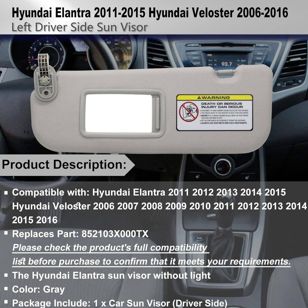 Grey left driver-side sun visor with vanity mirror and warning label