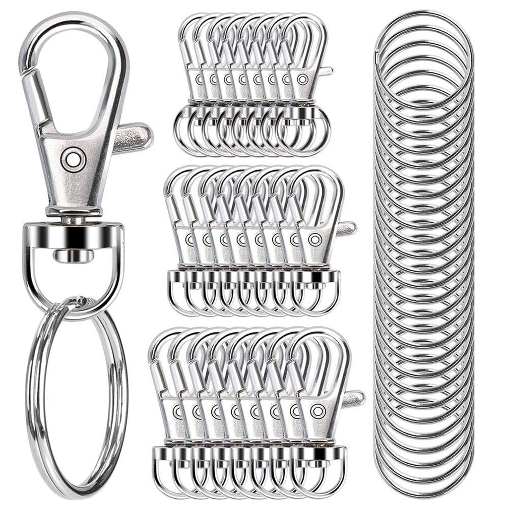 Assorted metal swivel snap hooks with key rings, shown in a grouped close-up