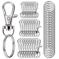 Assorted metal swivel snap hooks with key rings, shown in a grouped close-up