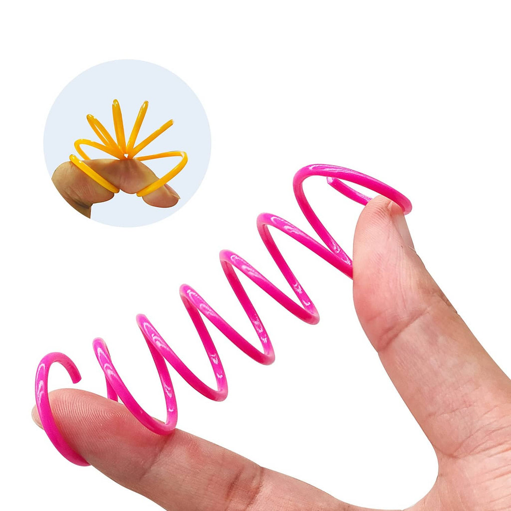Pink plastic cat spring toy coiled, held in a hand