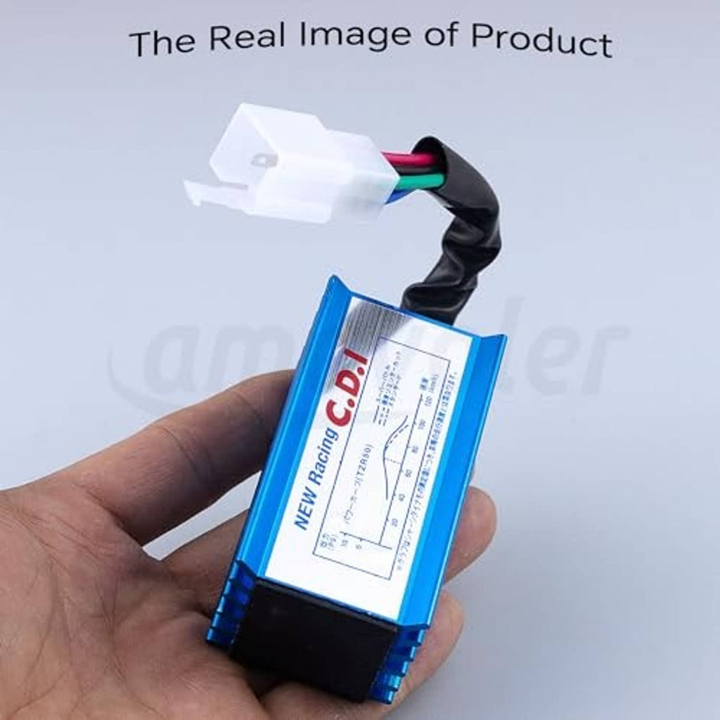Blue 5-pin AC CDI ignition box held in hand with white harness connector