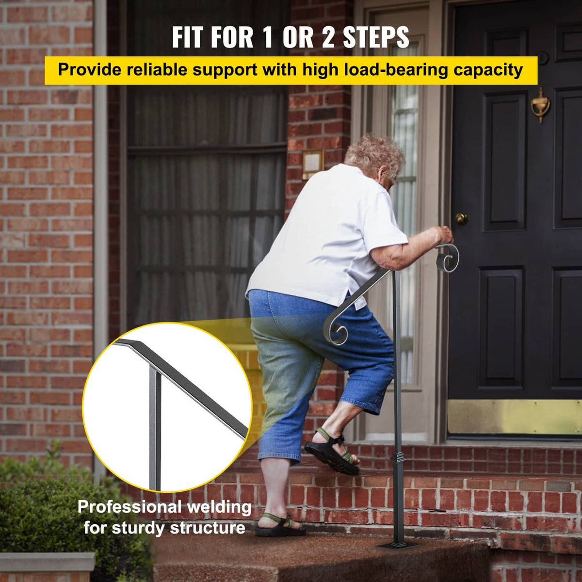 Matte gray single post handrail by a front door, showing curved end grip detail.