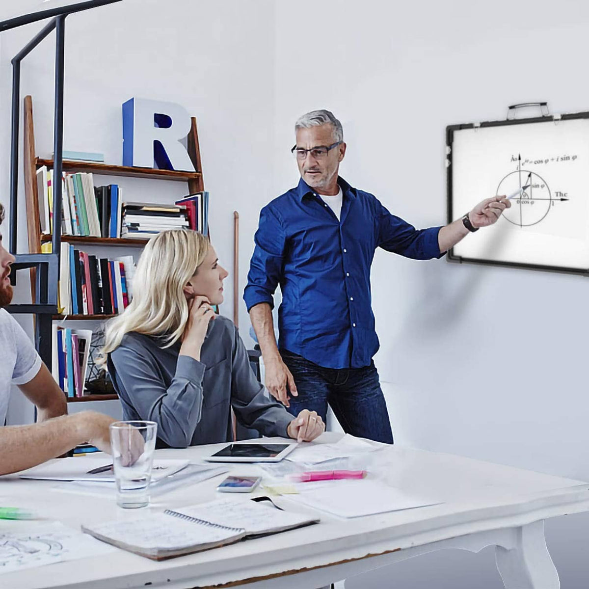 Portable dry erase whiteboard on stand, black frame with white writing surface
