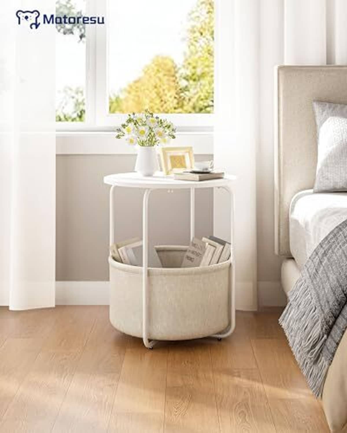 White round side table with beige fabric storage bin and open tabletop