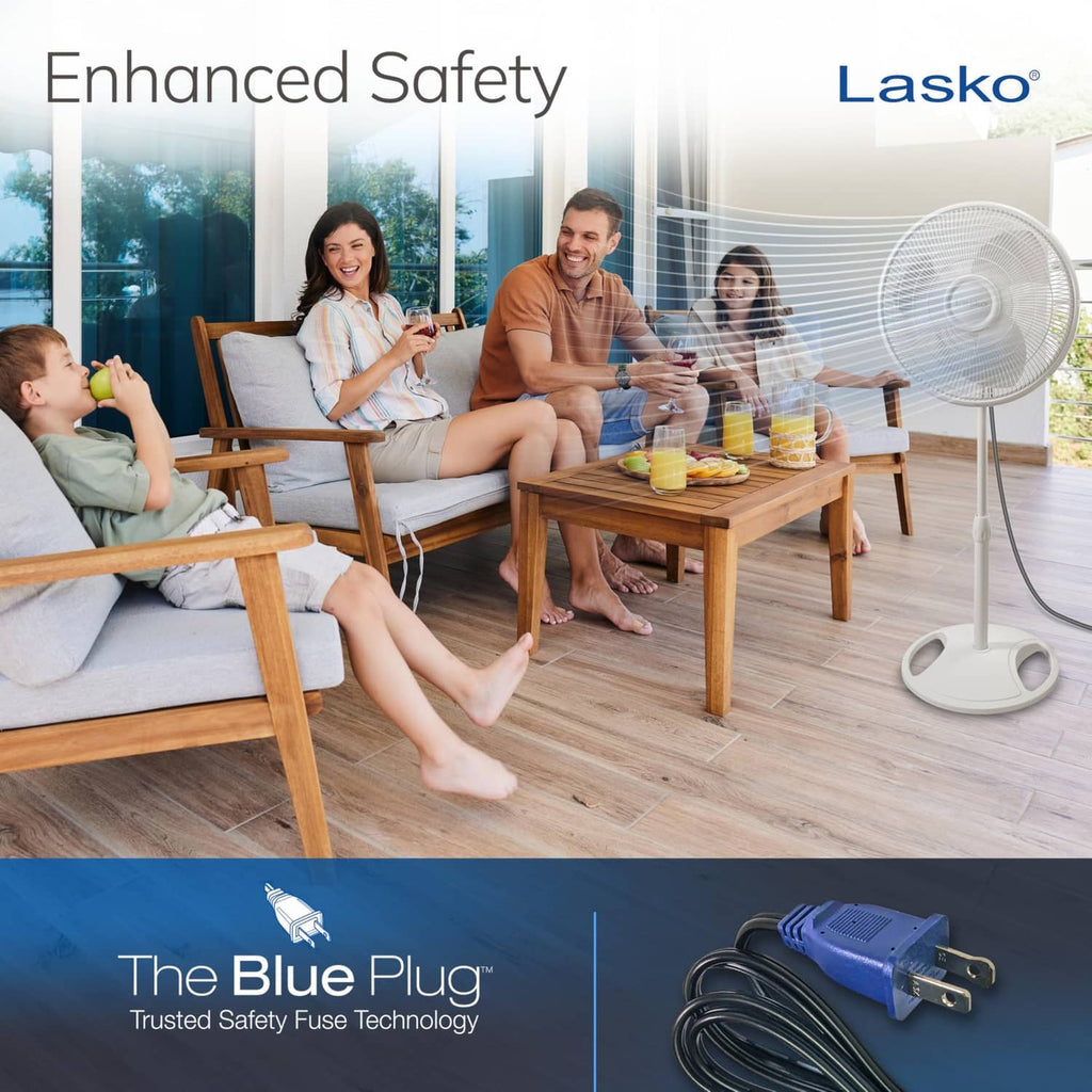 White Lasko oscillating stand fan with pedestal base and visible power cord.