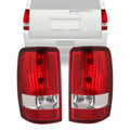 Red and clear rear tail light assembly with chrome bottom and round bulb sockets
