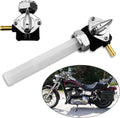 Fuel valve petcock with chrome switch housing, black base, and clear fuel tube with brass nipple.