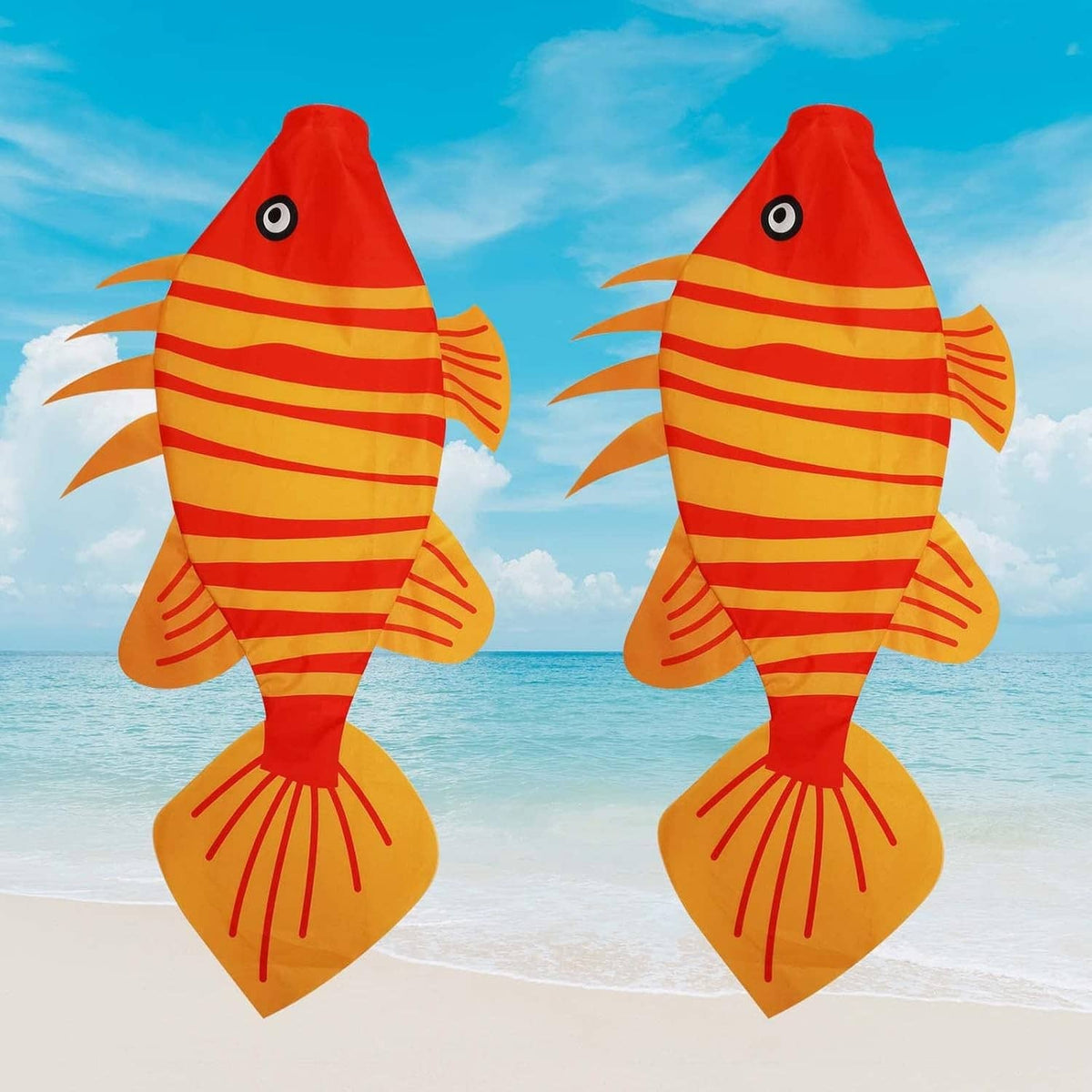 Pair of red and orange striped fish wind socks with eye and fin details