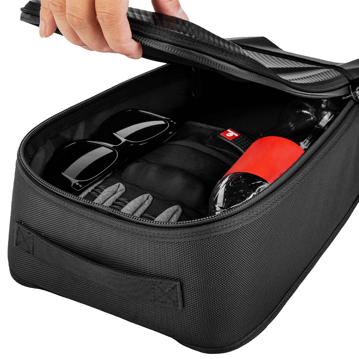 Black center console storage bag opened with sunglasses and small accessories inside