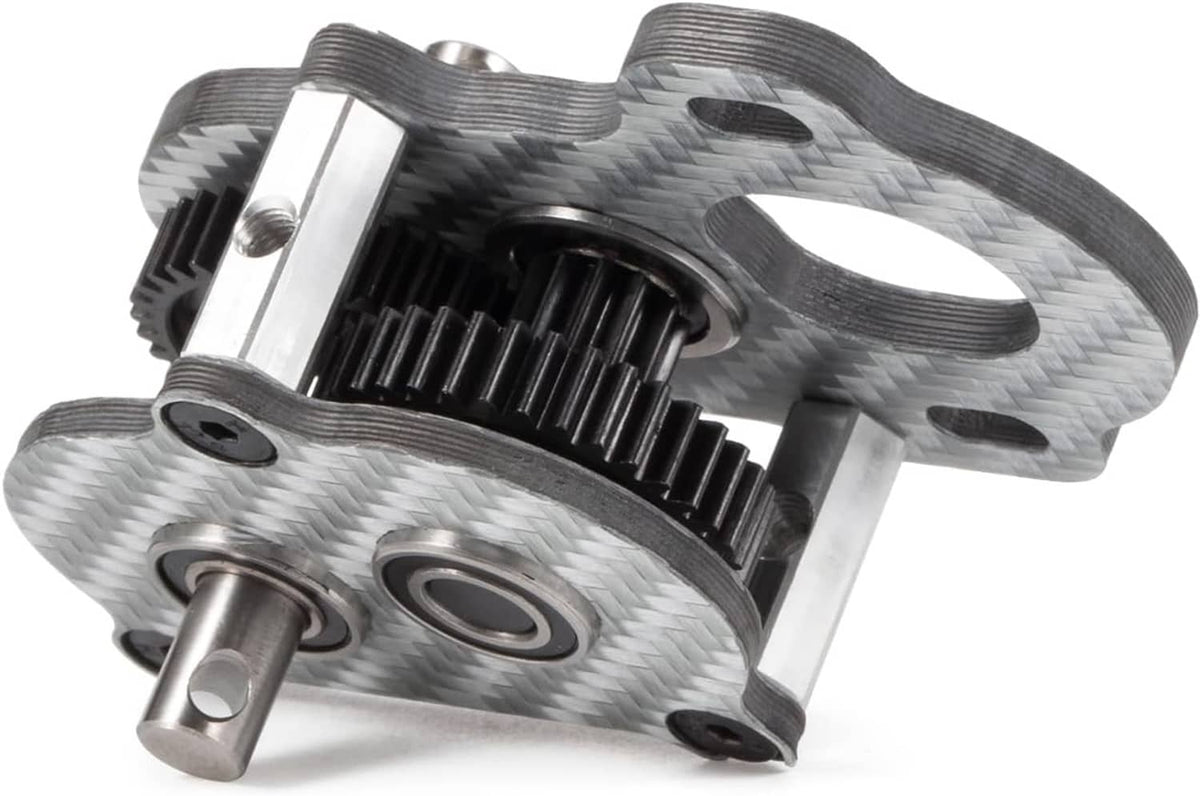 Carbon fiber portal transmission gearbox close-up of spur gear and metal shafts