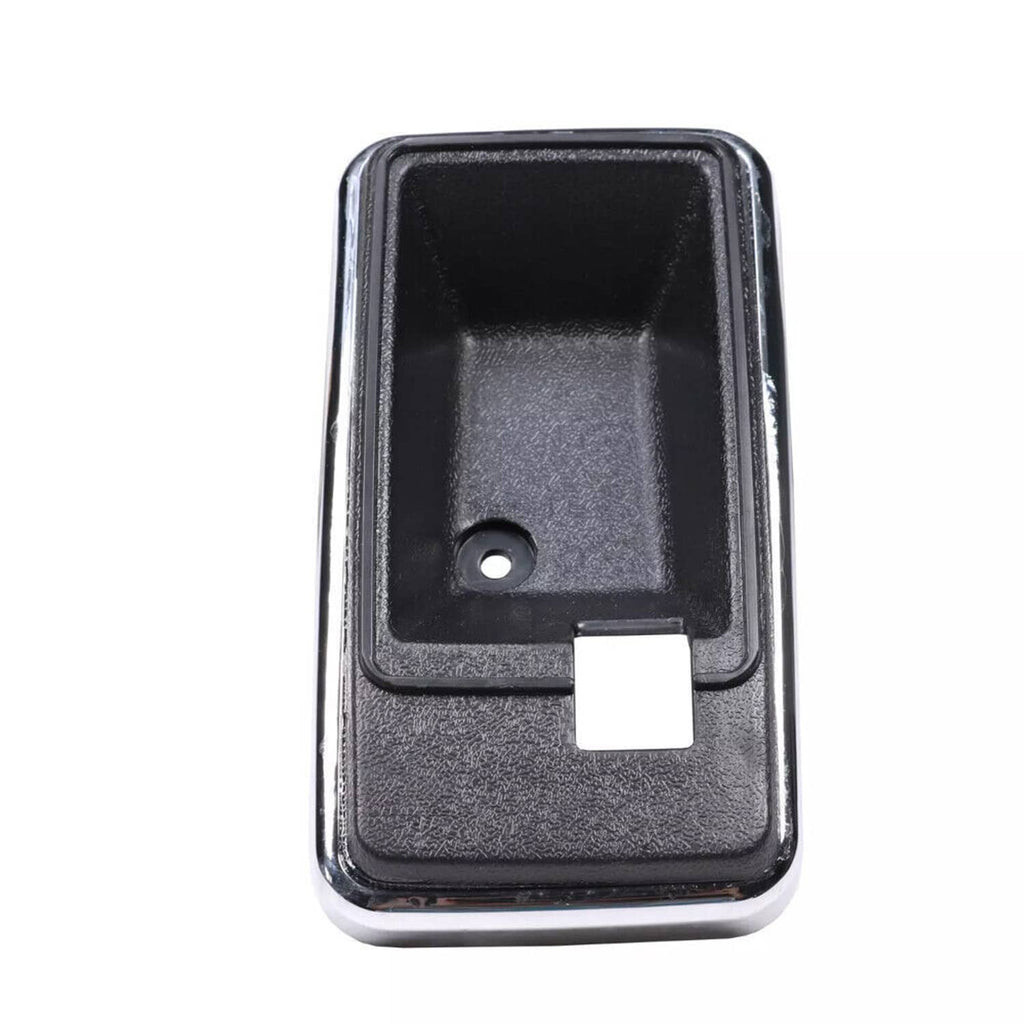 Interior door handle bezel cup, black textured insert with mounting hole and rectangular cutout