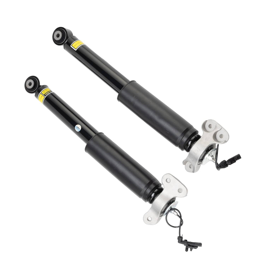 Rear shock absorber struts, black cylinders with top mounts and rod-end bushings