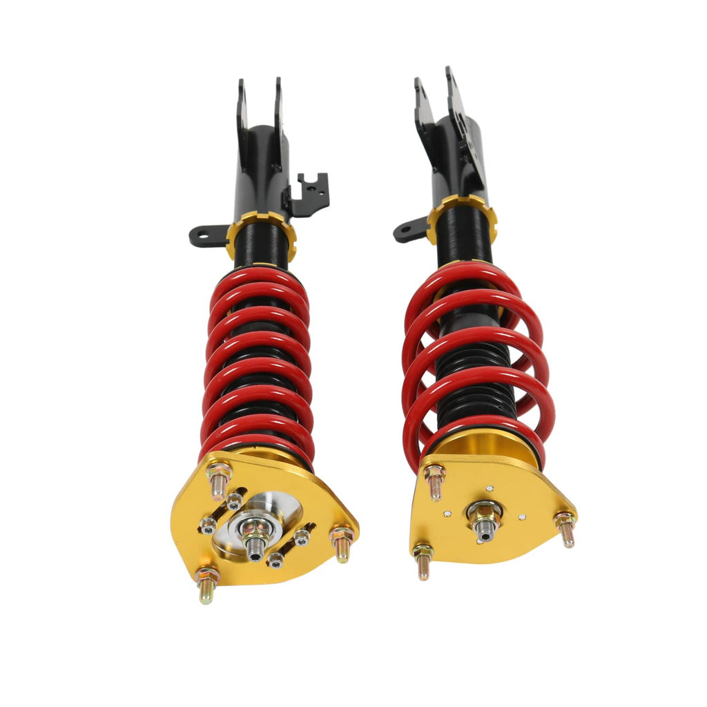 Pair of coilover suspension struts with red springs, black bodies, and gold mounts