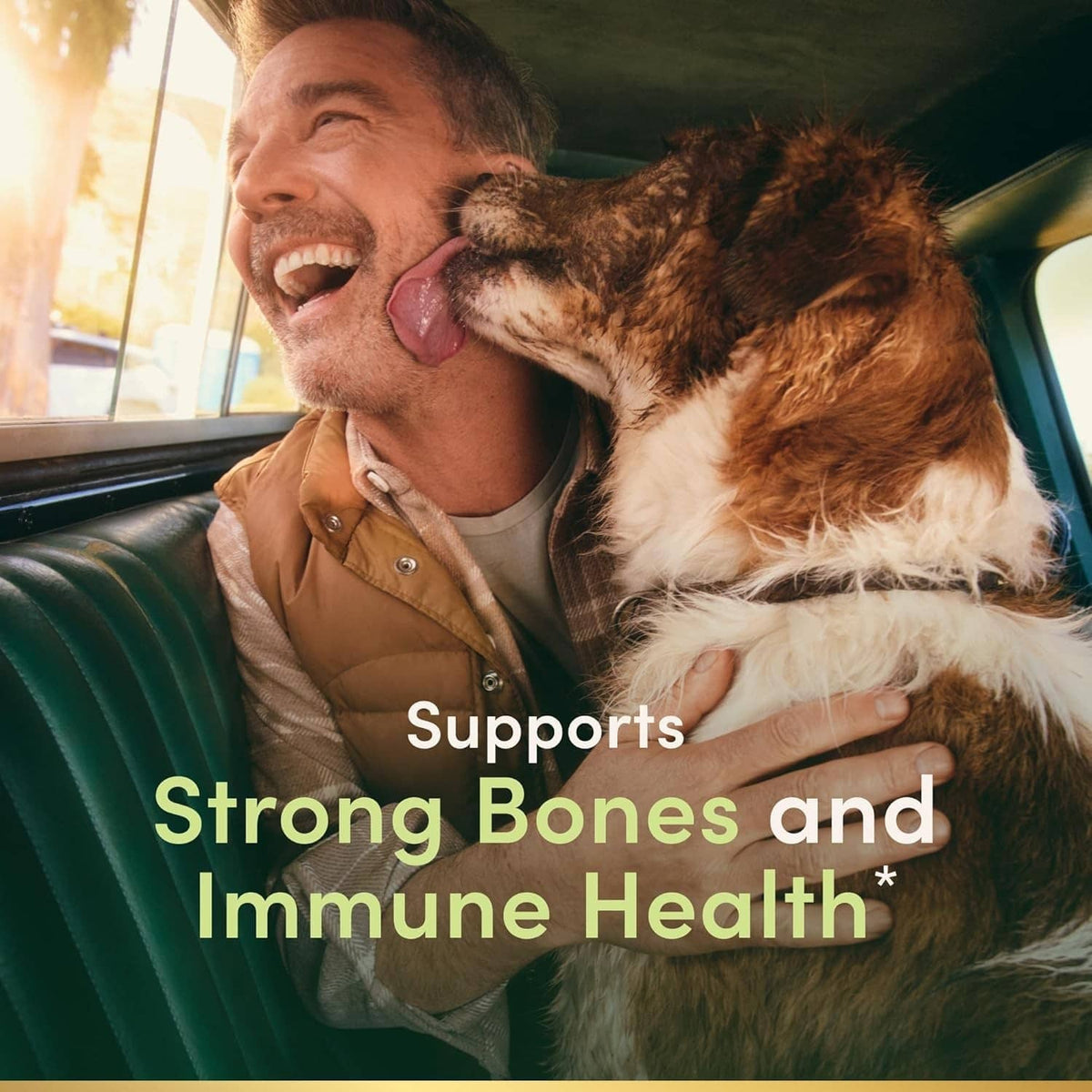Vitamin D3 2000 IU softgels ad: man with dog, 'Strong Bones and Immune Health'