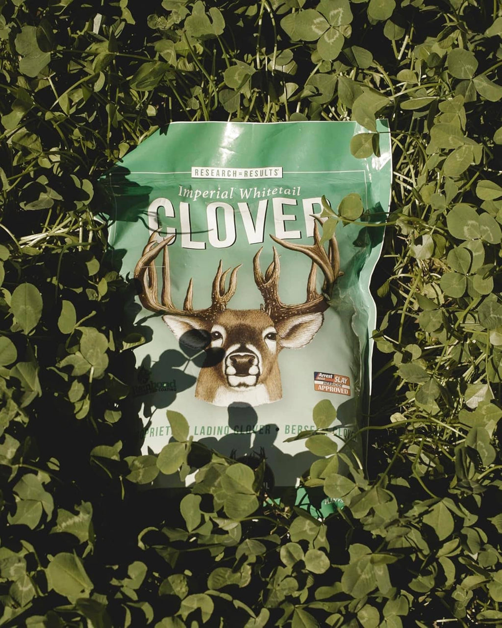 Imperial clover seed bag, green pouch with deer face and antler graphic