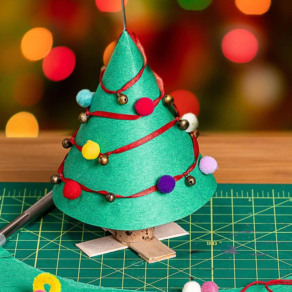 Green felt craft tree ornament with multicolor pom pom garland and beads