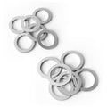 Six silver drain plug washers laid out in a group, round sealing rings