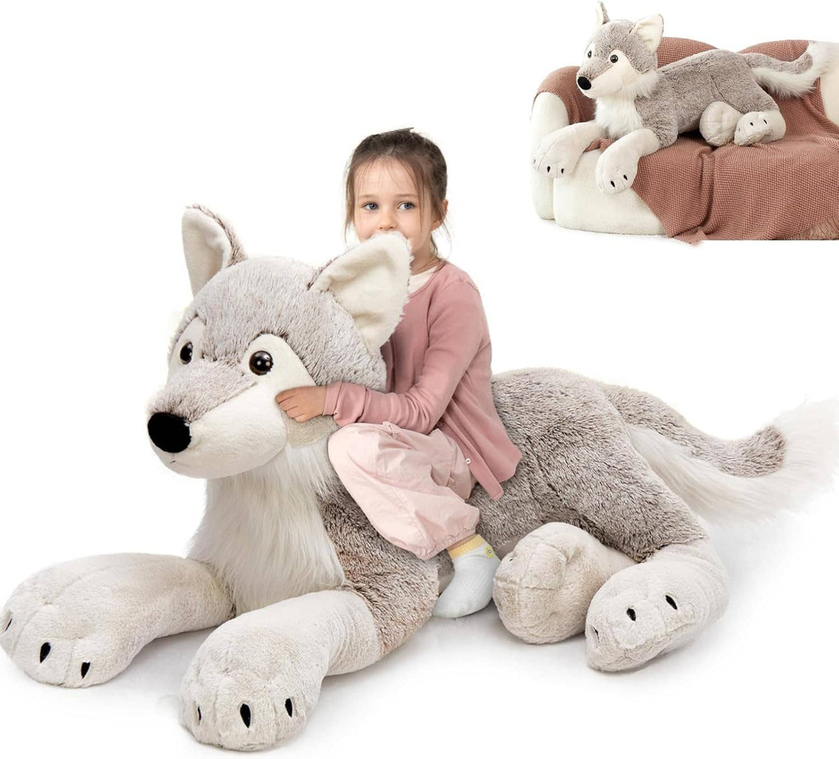 Large gray wolf plush stuffed animal with white muzzle and paws, lying down