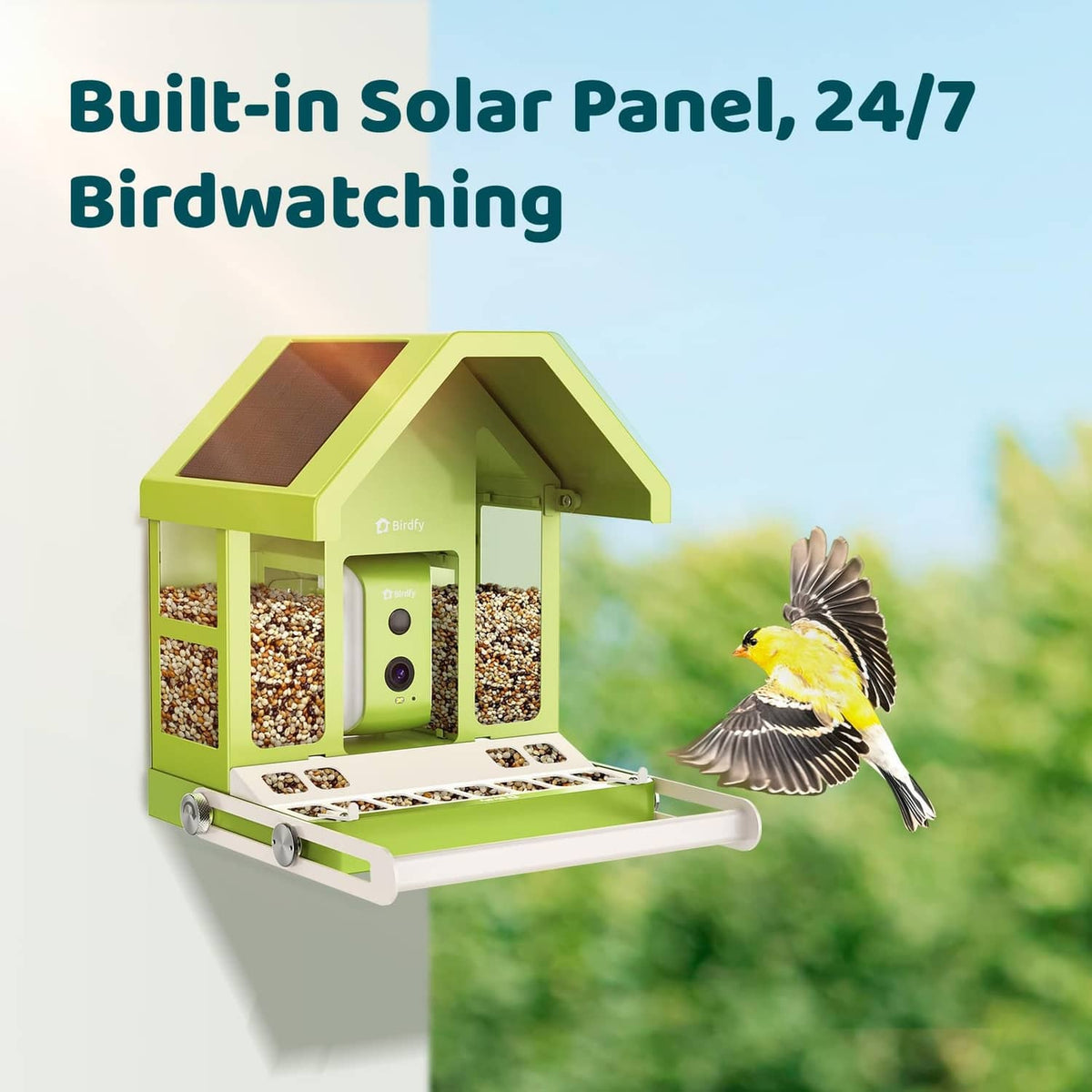 Green metal smart bird feeder with built-in solar panel and yellow bird in flight