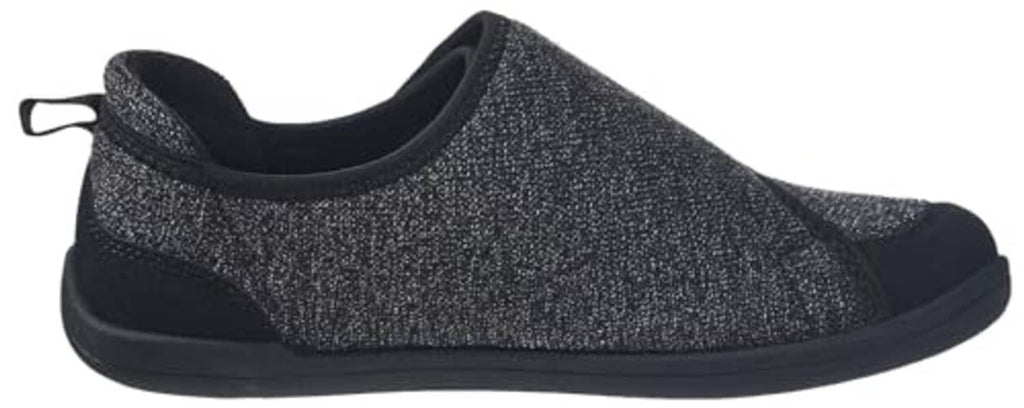 Dark slip-on slipper side view with low-profile outsole and hook-and-loop strap